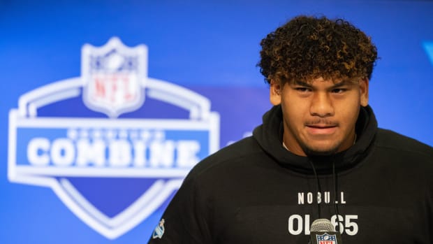 Brigham Young offensive lineman Kingsley Suamataia (OL65) talks to the media during the 2024 NFL Combine at Lucas Oil Stadium.